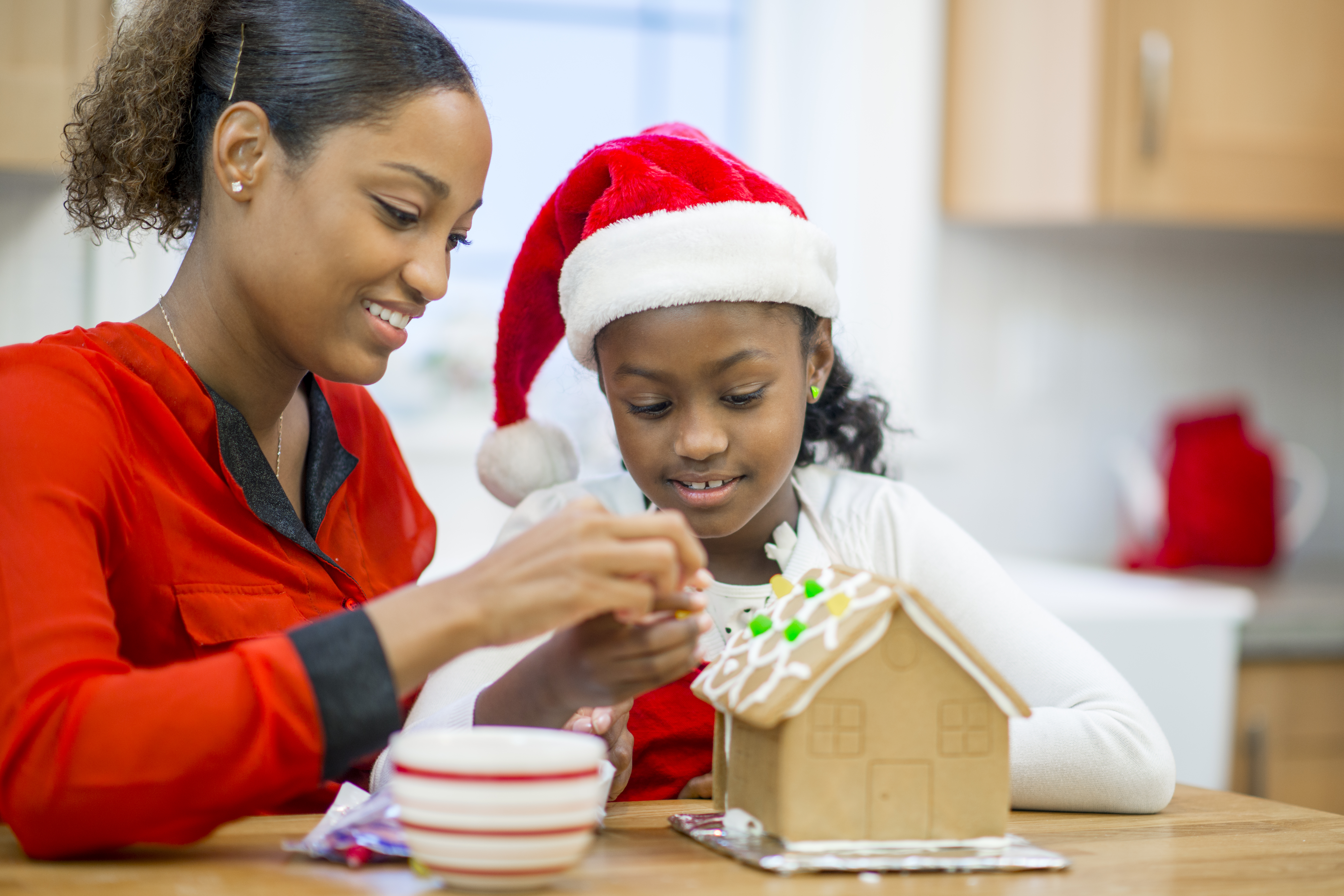 Putting Candy on a Gingerbread House