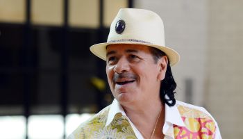 Carlos Santana And House Of Blues Staff Visits Agassi Prep With Musical Instrument Donation