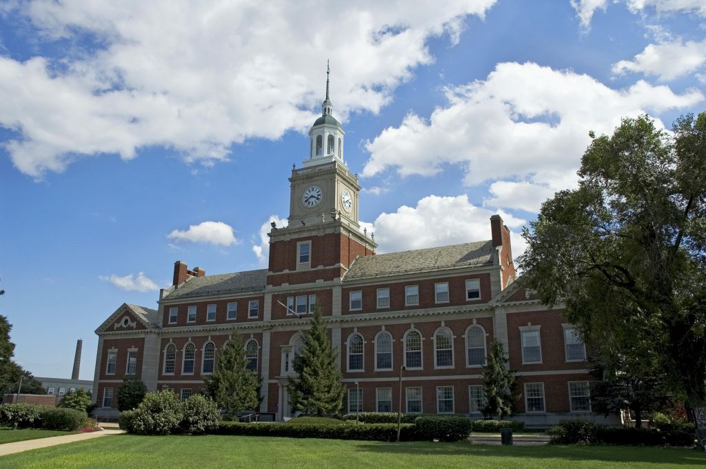 USA, Washington DC, Howard University, facade of historic Founders Library with blue sky and white clouds above