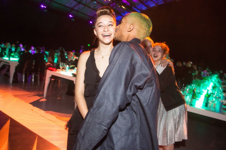 Jaden Smith kissing Odessa on the cheek.