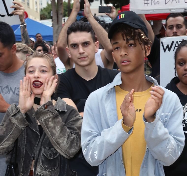 Jaden Smith giving a lazy clap.