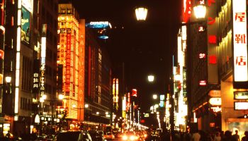 Japan, Tokyo, Traffic on busy Ginza street at night