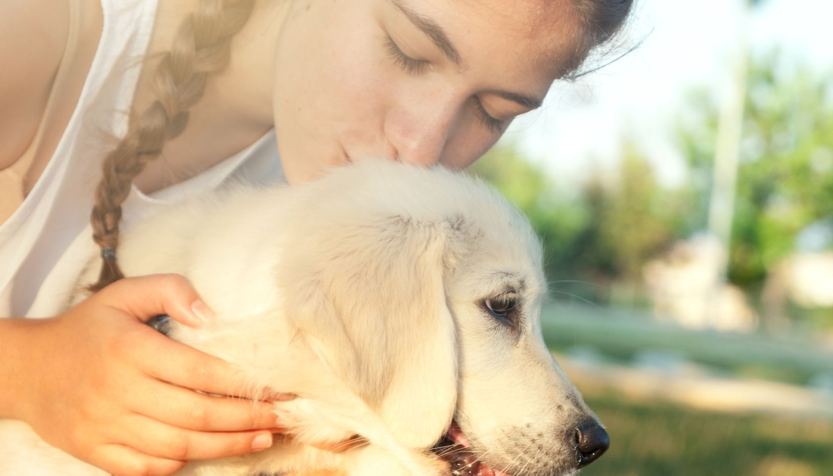 Teen girl and her puppy dog