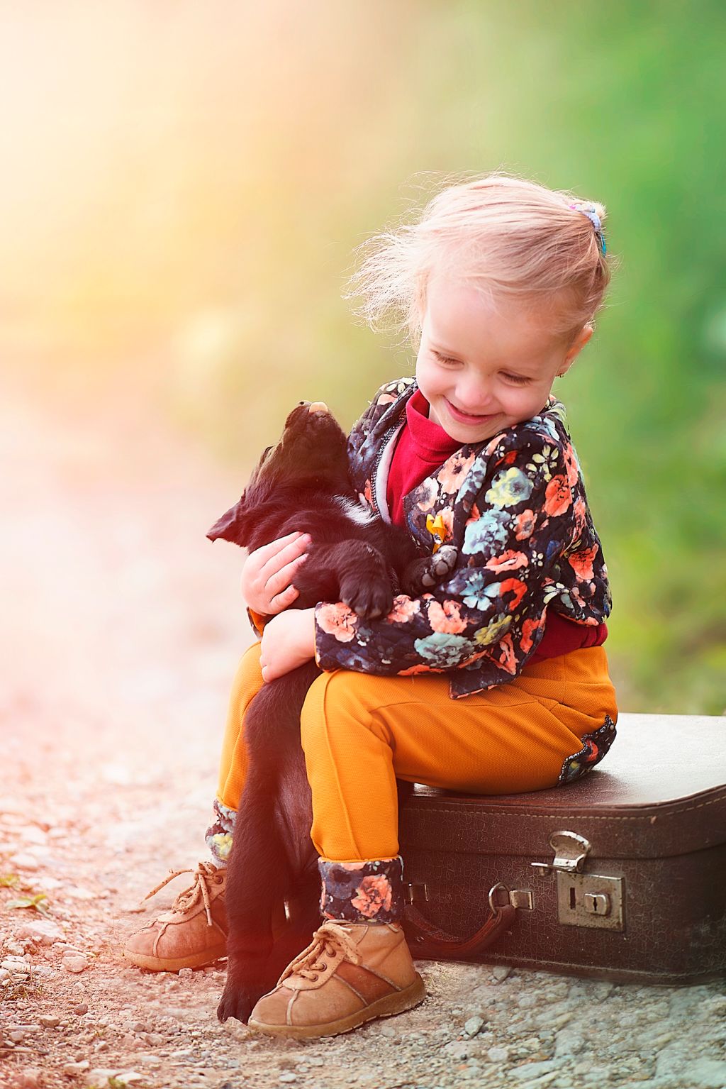Girl Playing with Puppy