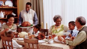 Family Enjoying Thanksgiving Dinner