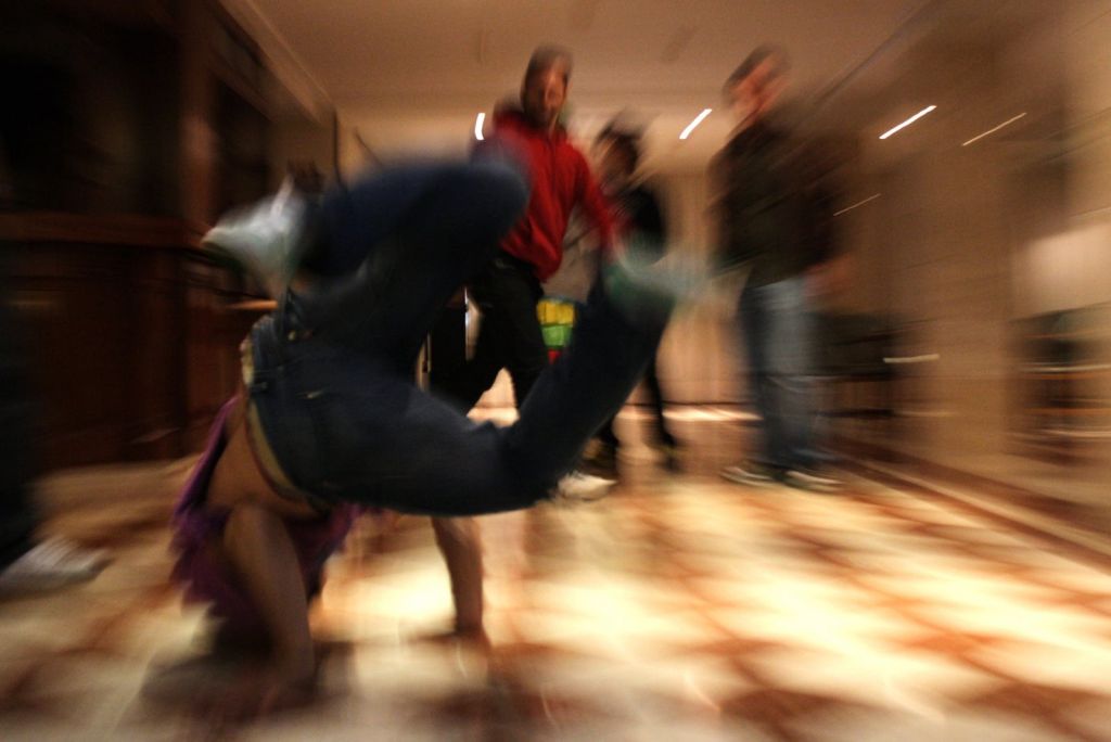 Blurred Image Of Man Dancing On Floor