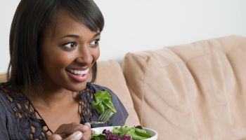 Young woman with salad