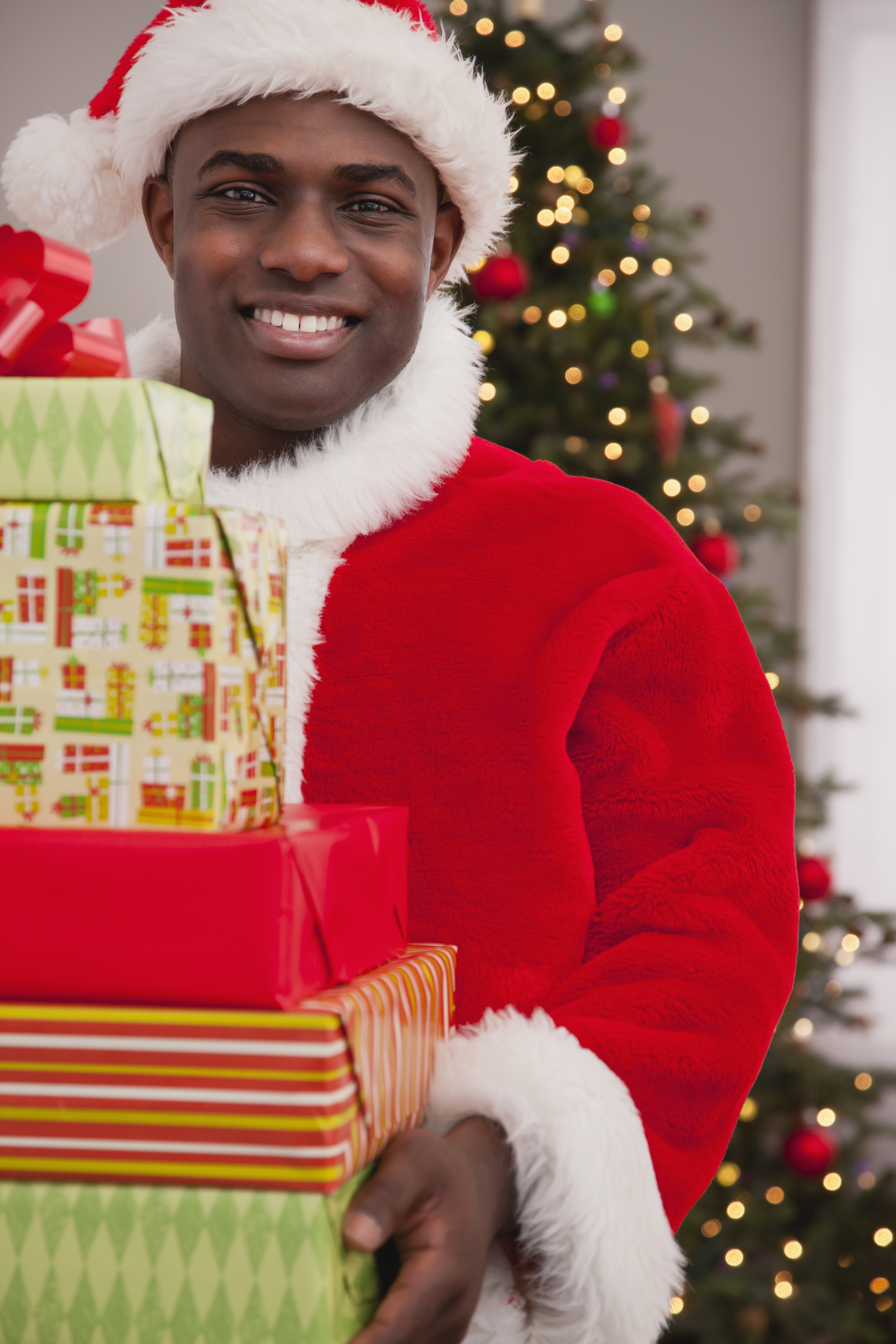 USA, Illinois, Metamora, Santa Claus with stack of gifts