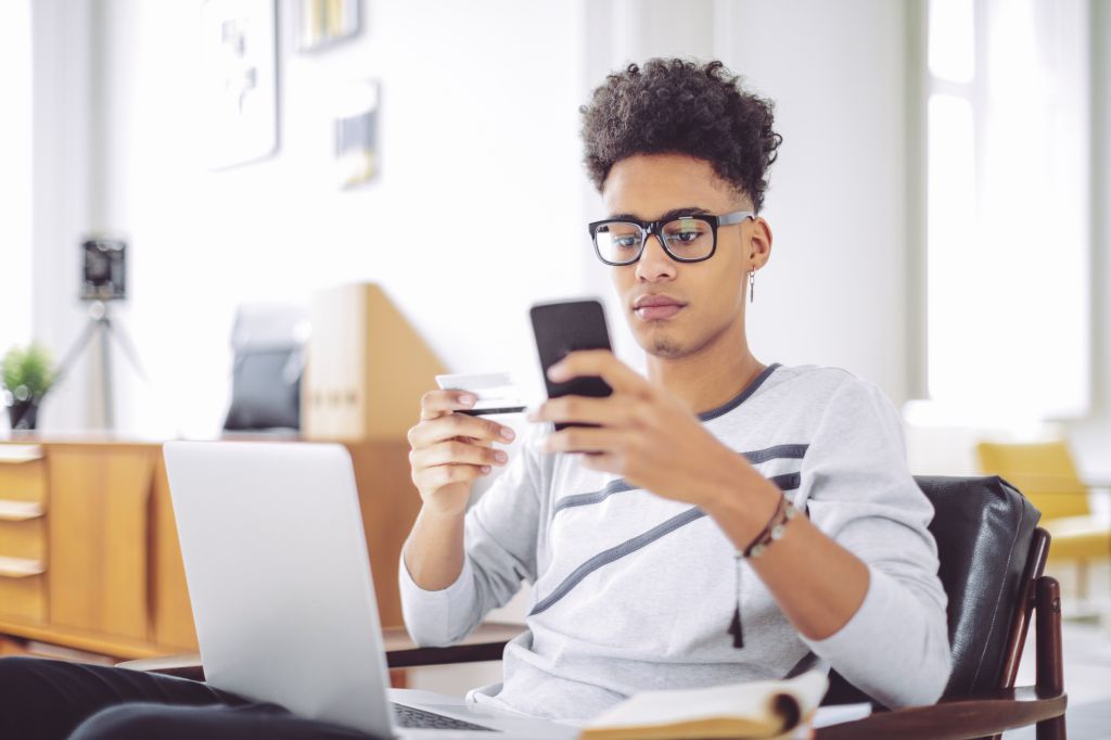 Young man working at home office