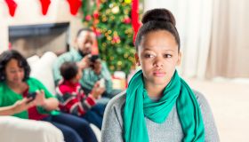 Teenage girl is ignored by family at Christmastime