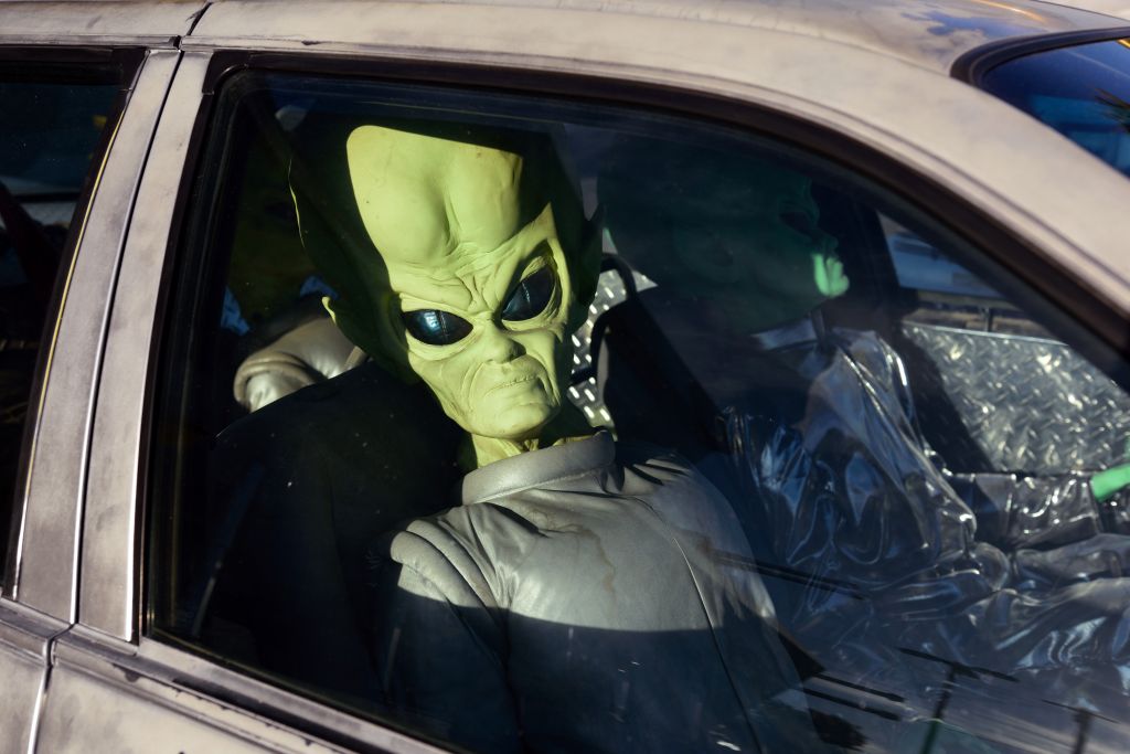 Alien in a car at Baker of California state in USA