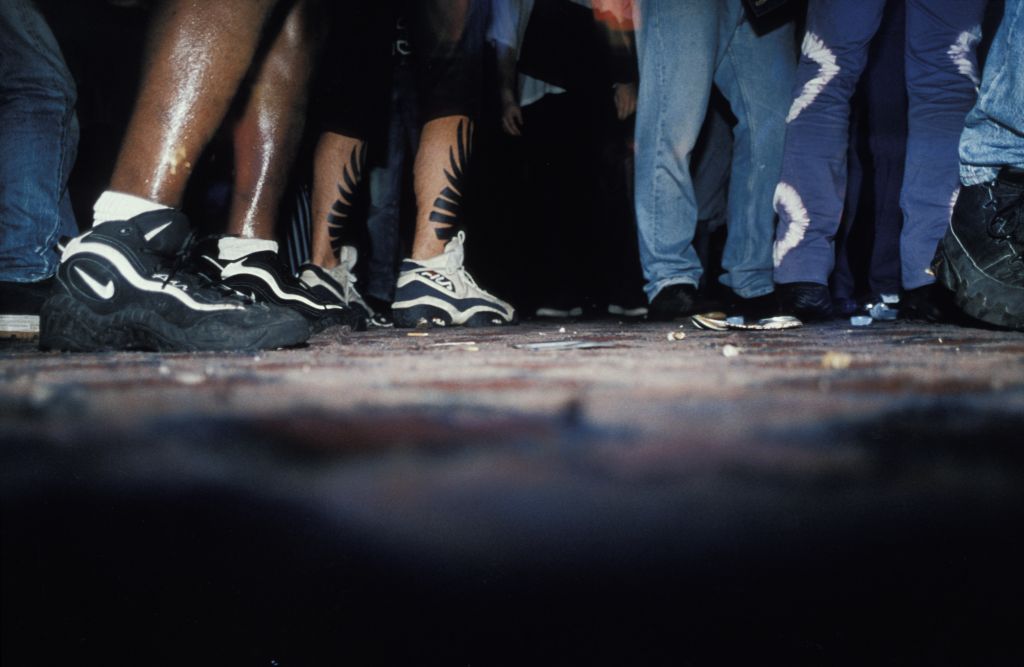 Close-up of trainers on the dancefloor. Free / Squat Parties 1997 - 1998