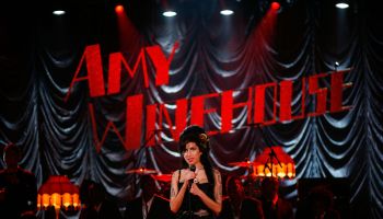 Amy performs for the 50th Grammy Awards ceremony via video link in 2008