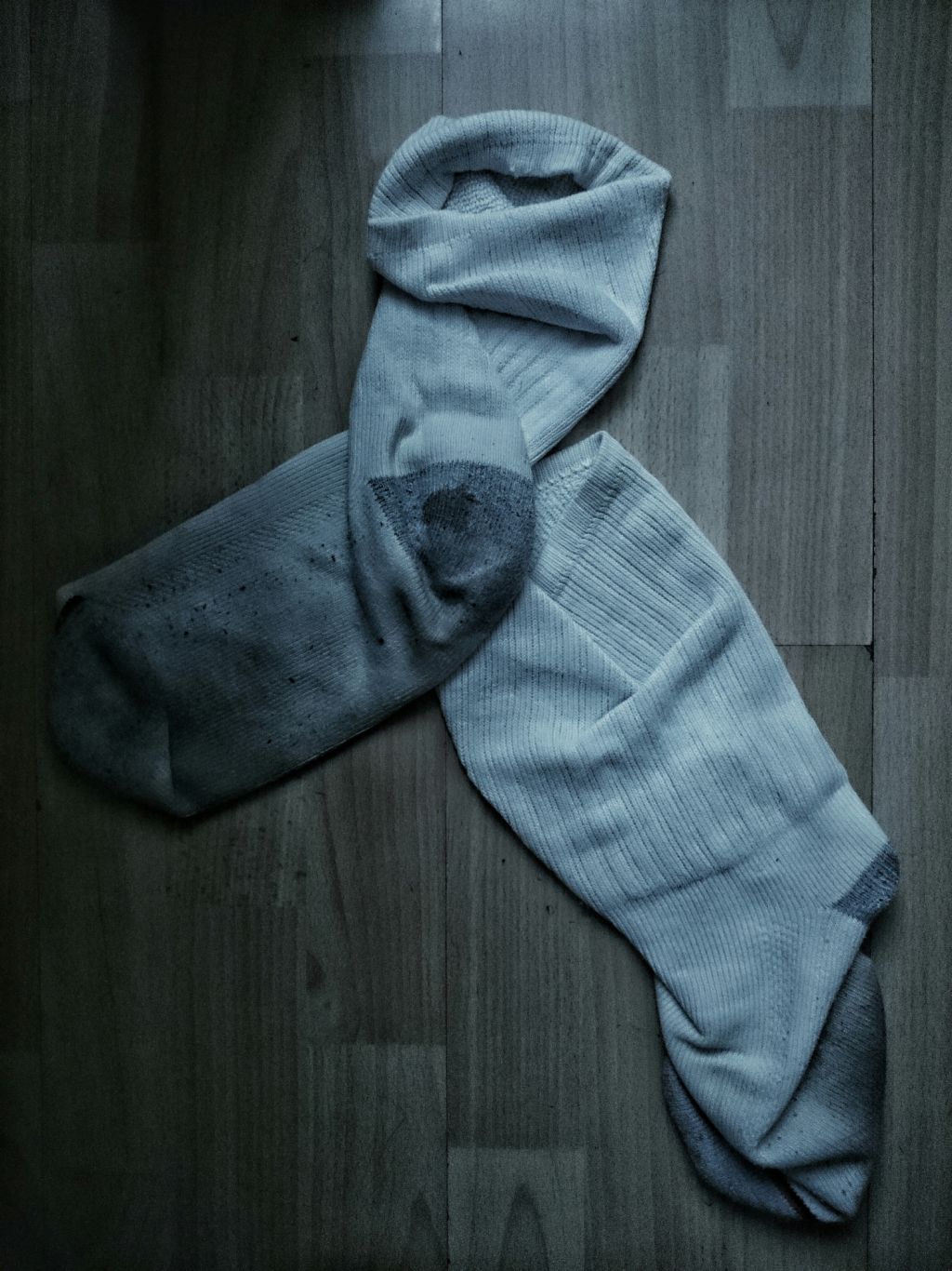 Directly Above View Of Socks On Hardwood Floor