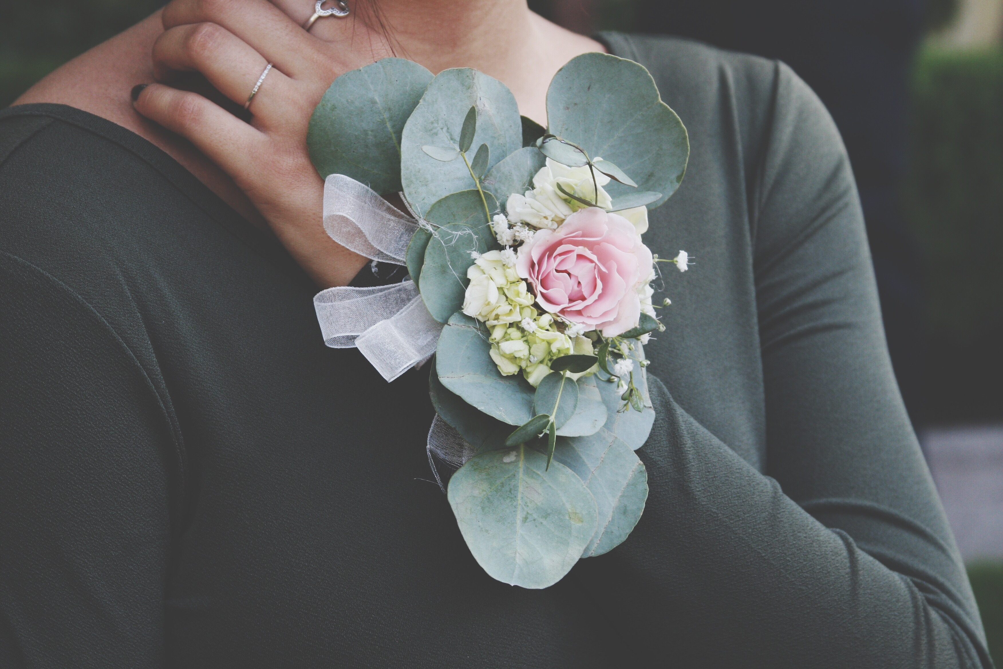 Close-Up Of Hand With Corsage