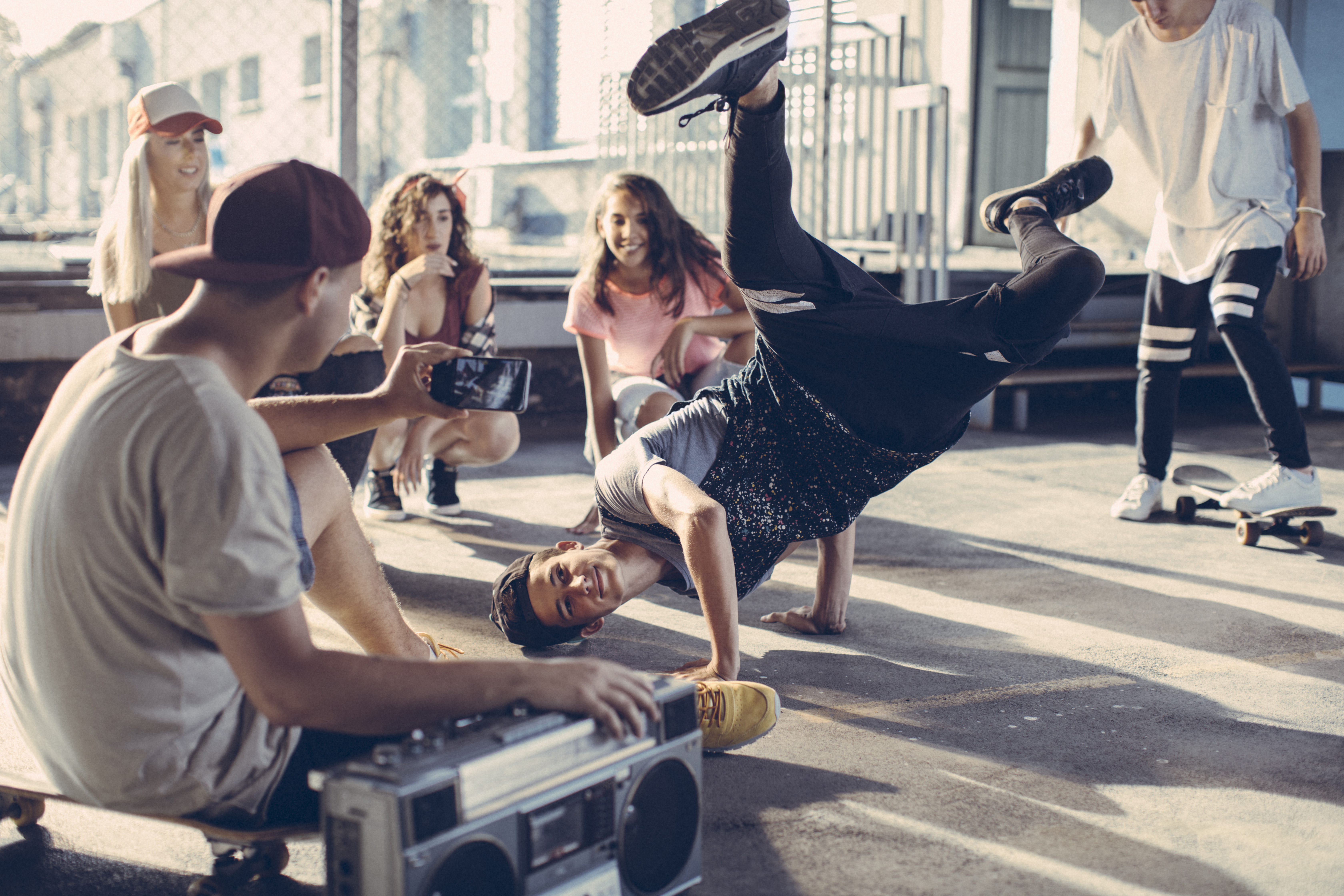 Break dancers filming themselves