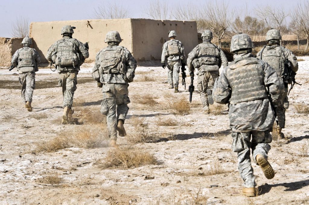 U.S. Army soldiers respond to a small arms attack in Badula Qulp, Afghanistan.