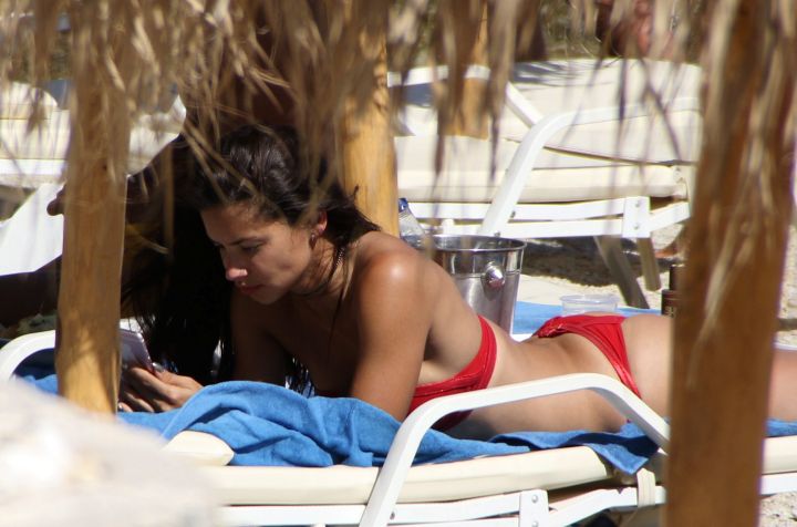 Adriana Lima relaxes on the beach in Mykonos