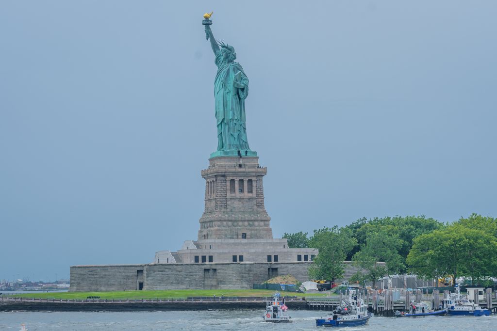Liberty Island was evacuated because of a person climbing...