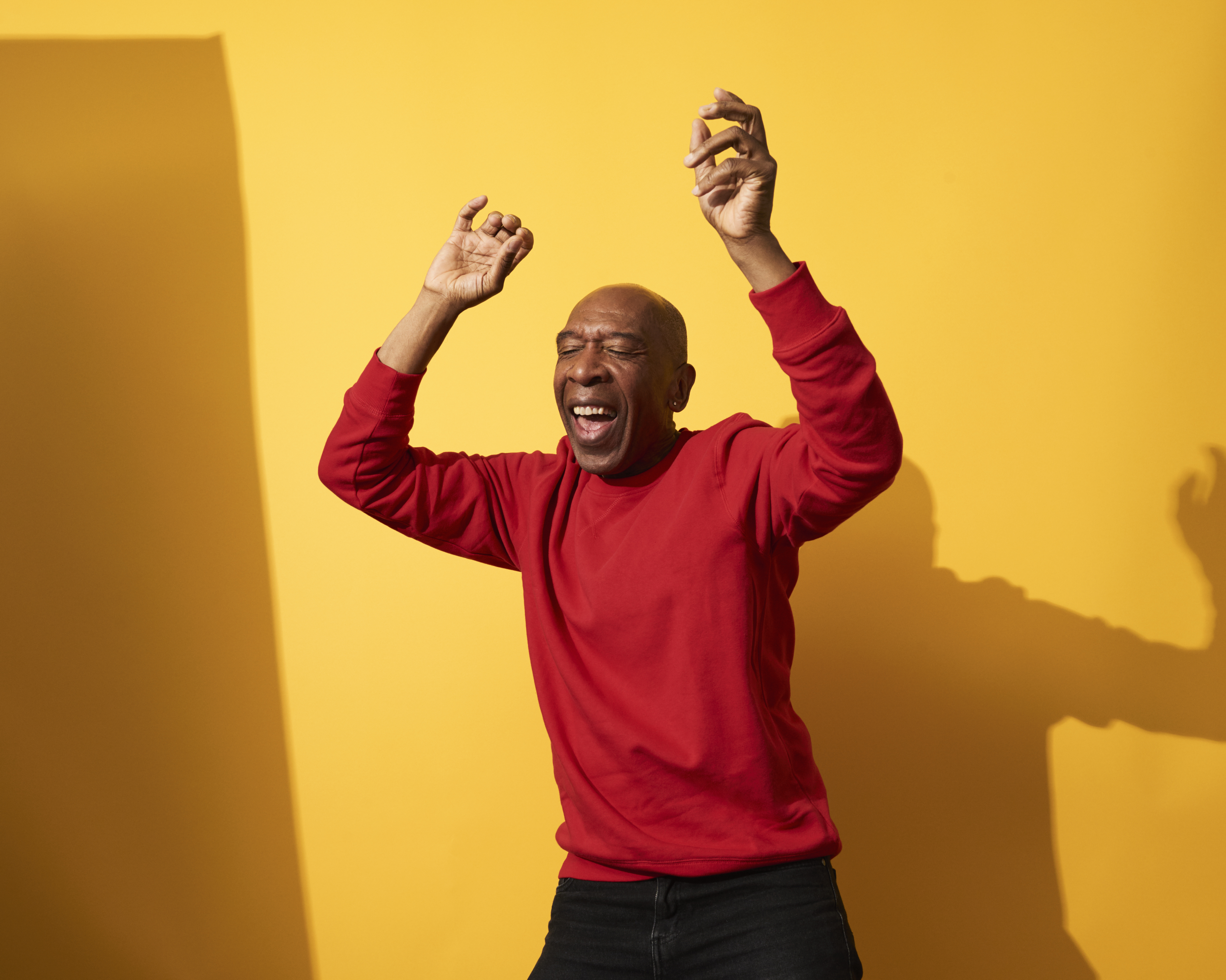 Portrait of mature man dancing and having fun