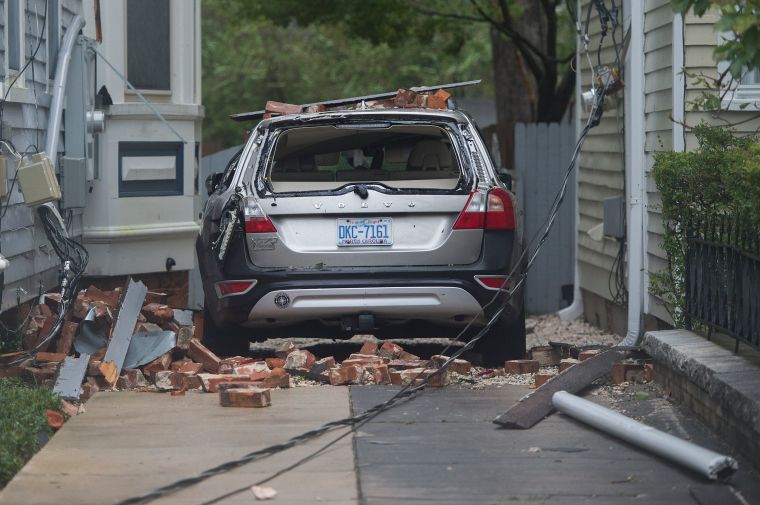 A car is destroyed by falling bricks in Wilmington.