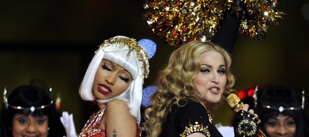 Singer Madonna (L) and Nicki Minaj perfo