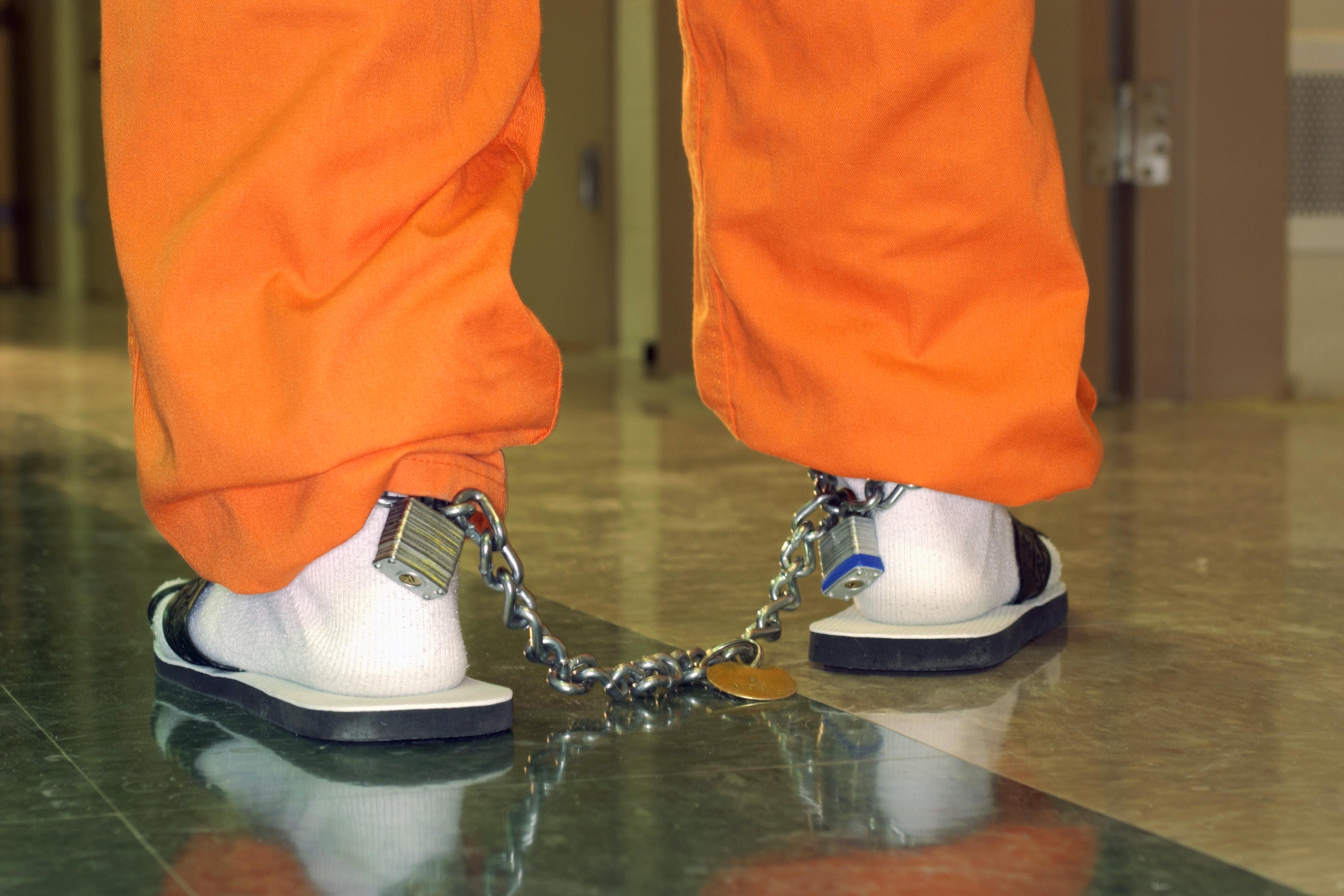 Shackles on legs of inmate