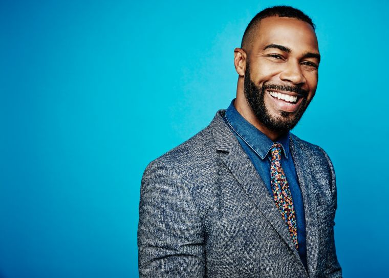Omari Hardwick Is all smiles