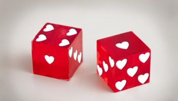 Studio shot of dice with hearts