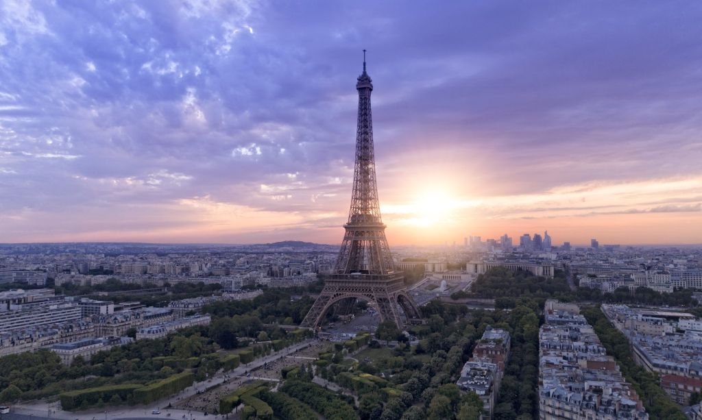Aerial view of Paris skyline with Eiffel tower during sunset