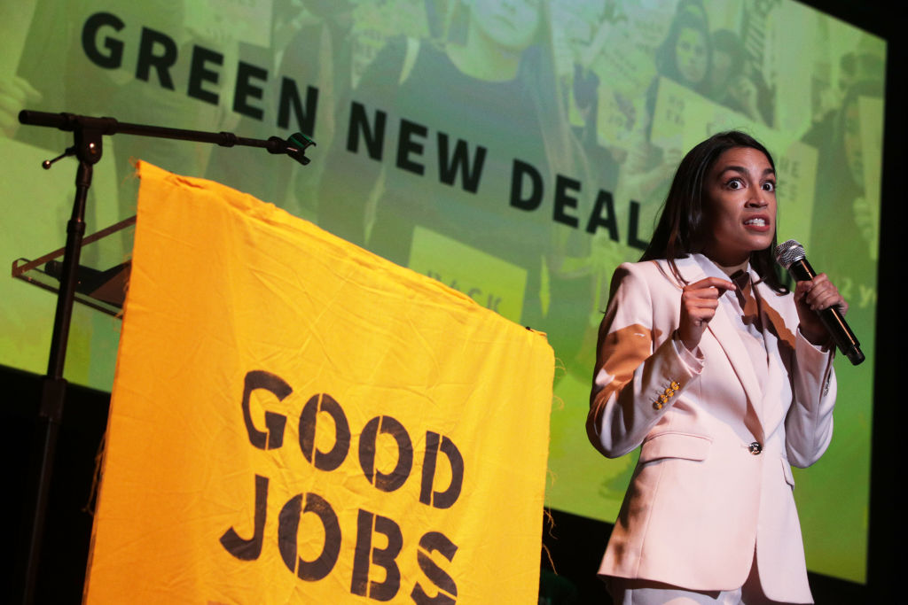 Alexandria Ocasio-Cortez And Bernie Sanders Attend Green New Deal Rally At Howard University