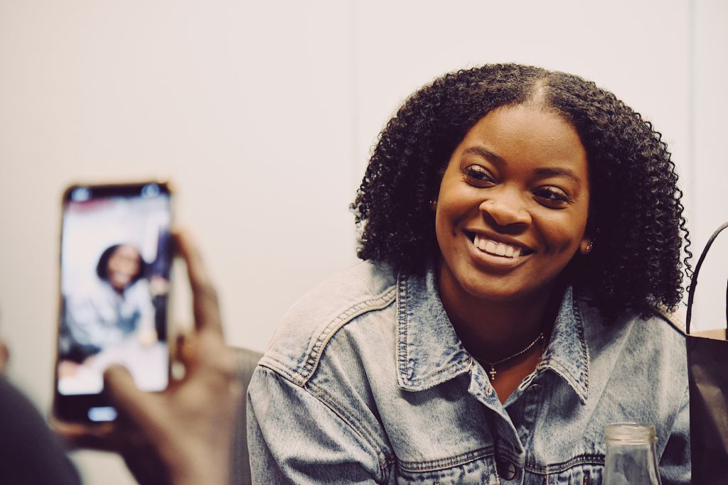 Ari Lennox smiling