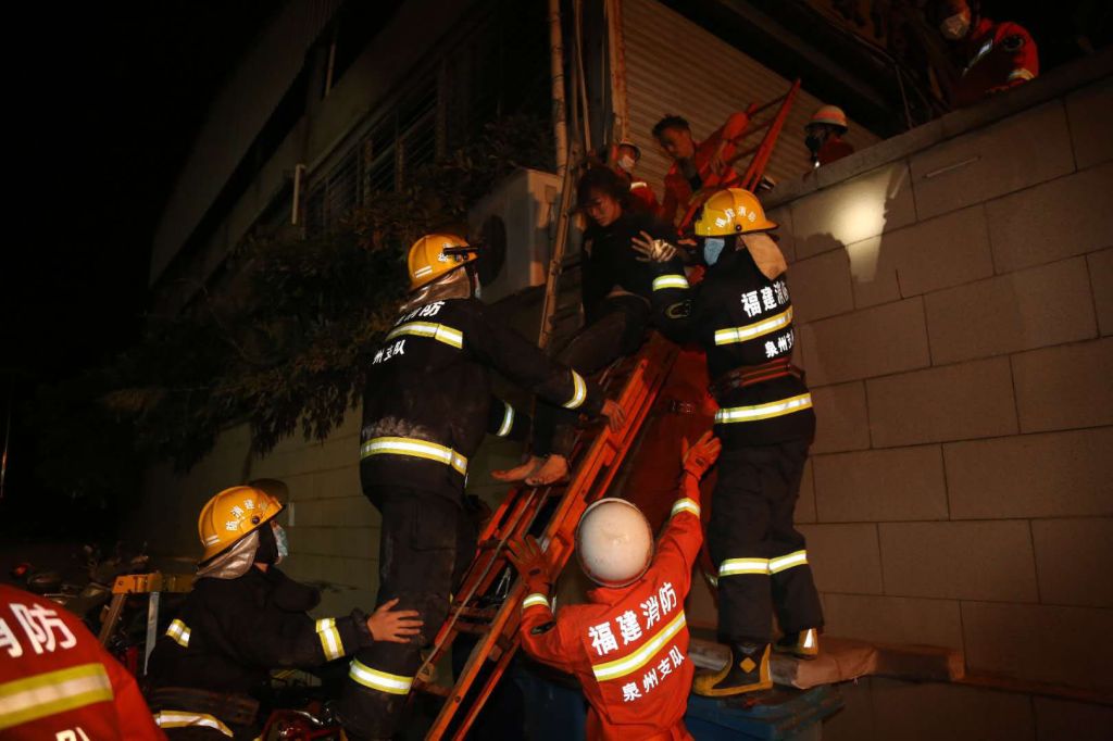 RESCUE WORKERS AT CHINA QUANZHOU HOTEL BUILDING COLLAPSE CORONAVIRUS QUARANTINE