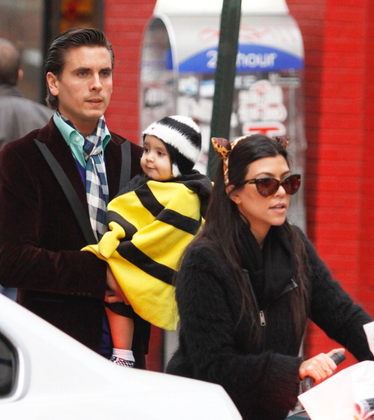 Not even 1-year-old yet, Mason hits up the swanky streets of Manhattan with his famous parents.