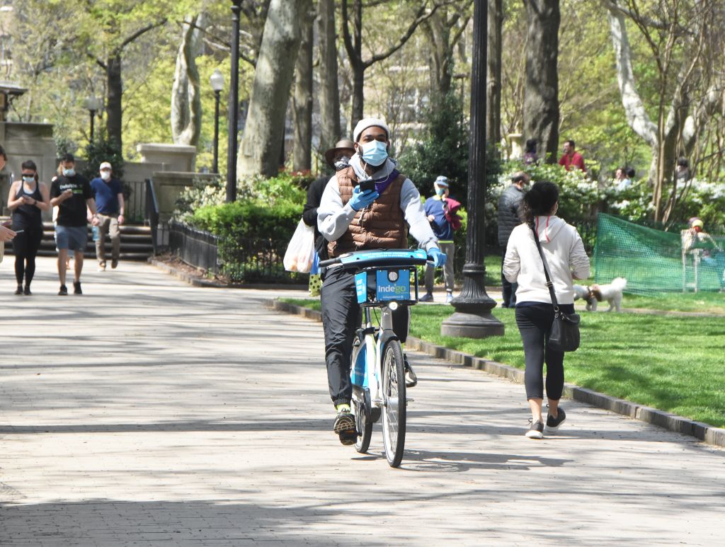 People enjoy the spring weather while maintaining social-distancing in Philadelphia, United States during the Covid-19 pandemic