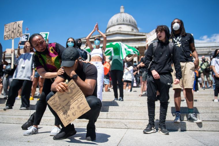 An emotional moment captured between protesters in London.