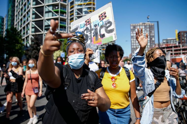 The crowd marching in London.