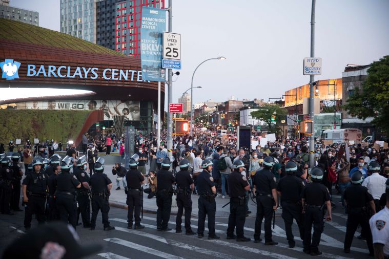 Police officers pictured during protests in Brooklyn, NY.