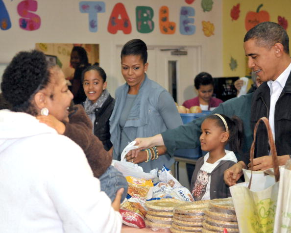 The Obama family distributes food at Martha's Table.