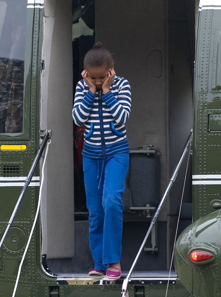 Stepping off Marine One.