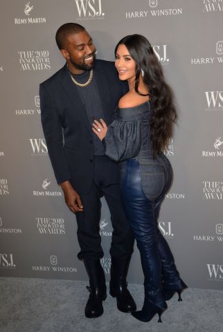 Kanye West, Kim Kardashian West at arriv...