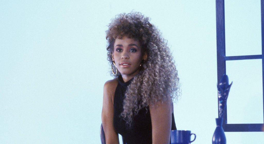 Glam To Chic: Whitney Houston's Most Memorable Hair Moments [Photos]