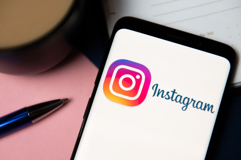 In this photo illustration an Instagram logo displayed on a...
