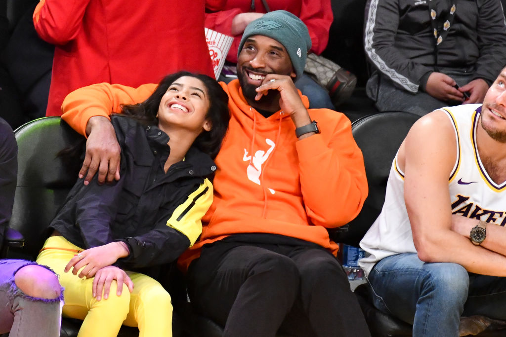 Gianna and Kobe Bryant smiling at 2019 Los Angeles Lakers Game