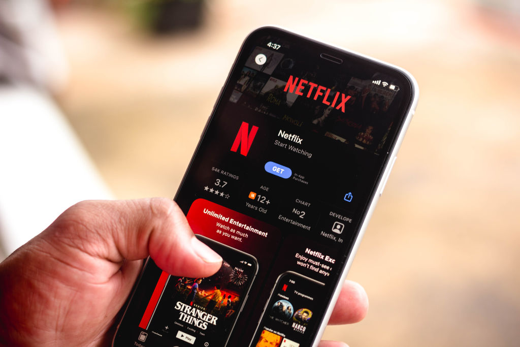 In this photo illustration the Netflix logo in App Store...