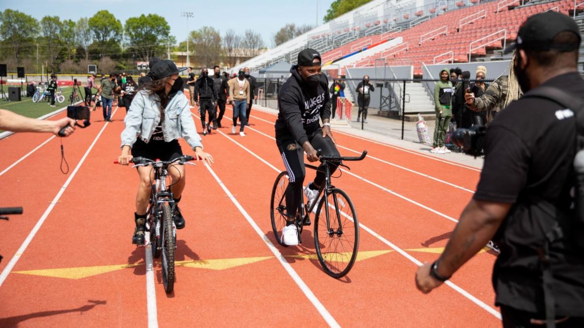 Jeezy & Jeannie Mai Gift ATL youth bicycles