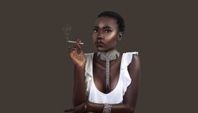Joint Smoking Stylish Black Lady in Silver Jewelry