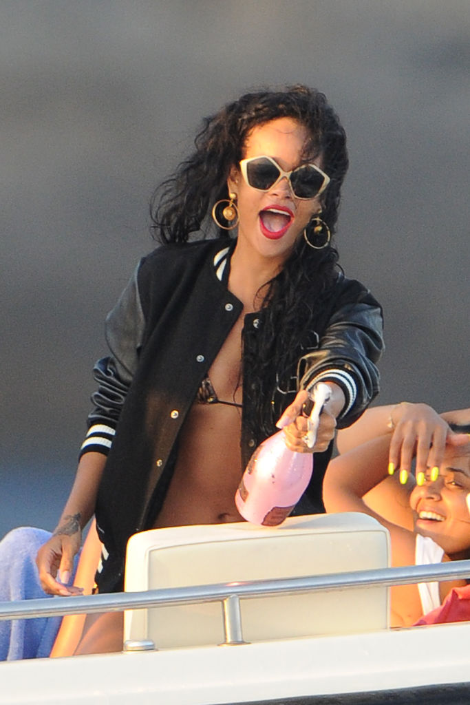 Rihanna Stays With A Glass/Bottle In Hand