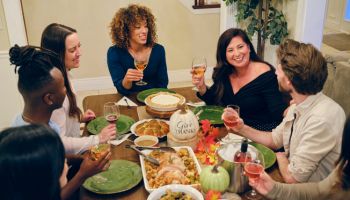 Friends Celebrating Thanksgiving Dinner Together