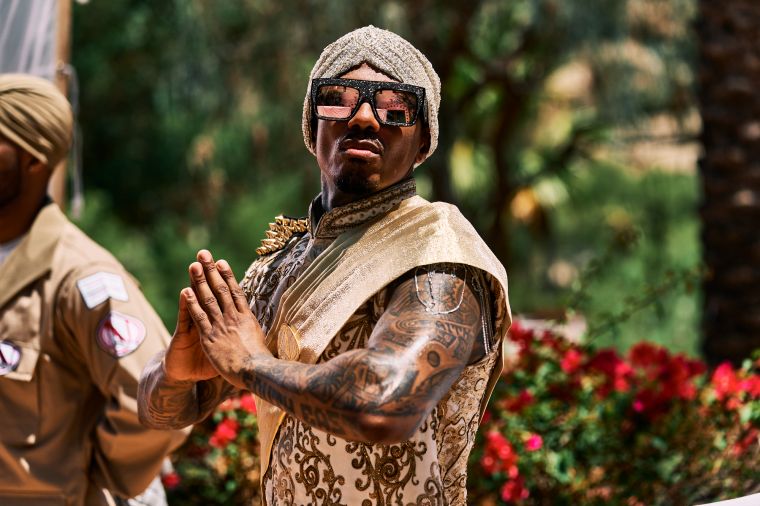 Nick Cannon With The Guns Out